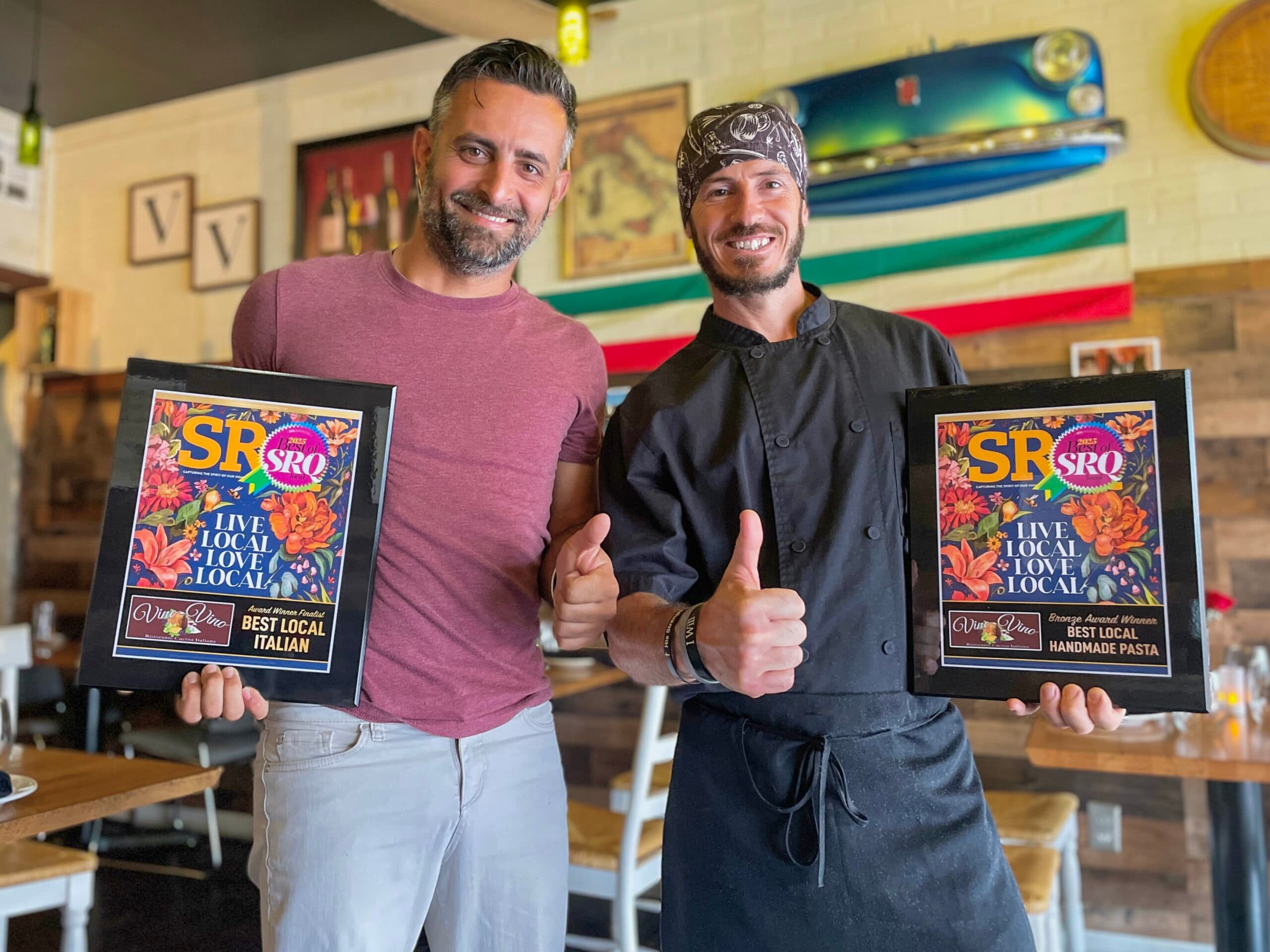 Francesco and Ciro, the chef-owners of Vino Vino, holding their 2025 Best of SRQ awards for Best Local Italian and Best Local Handmade Pasta